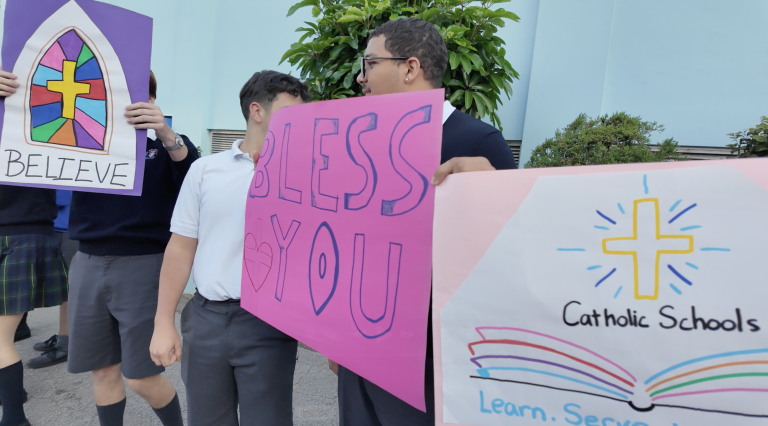 Waving MSA students brighten commuters’ day
